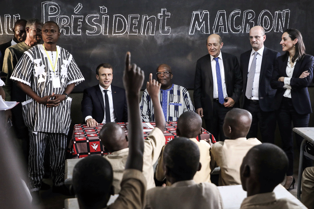 President Macron with Burkina Faso's President Roch Marc Christian-Kabore Ludovic Marin/AFP/Getty Images
