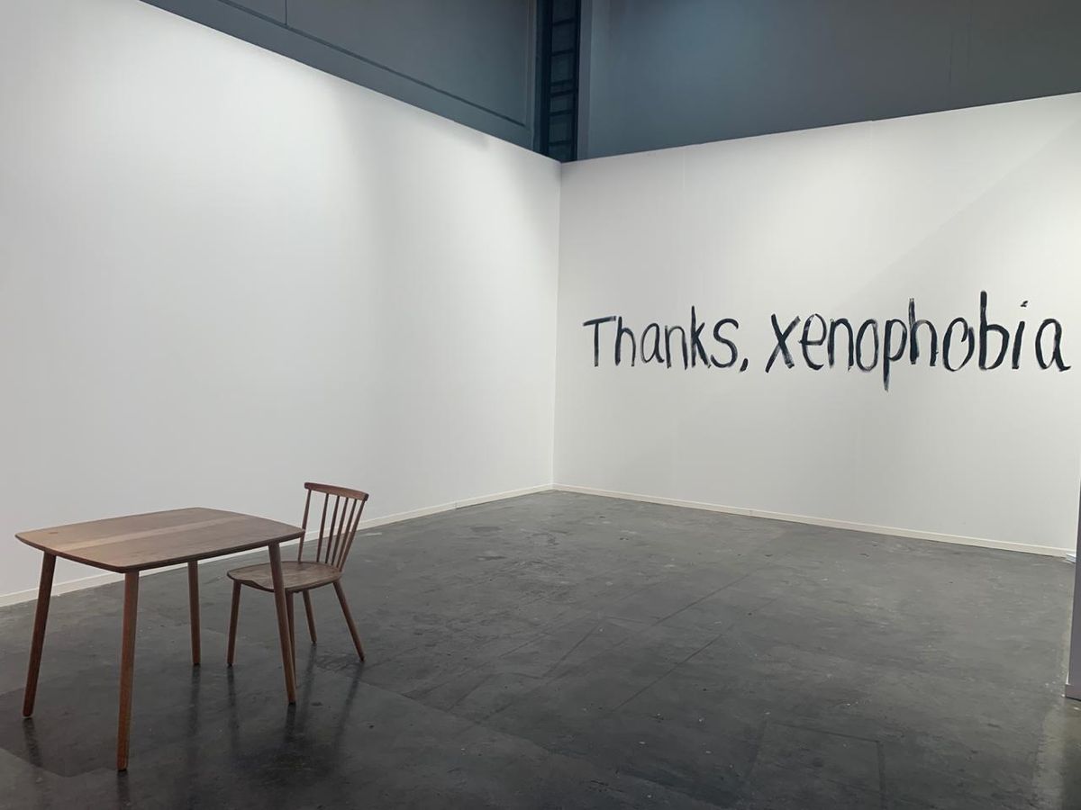 “Thanks xenophobia” was painted on the back wall of the Nigerian gallery 16/16’s empty booth at FNB Art Joburg Courtesy of Stevenson Gallery