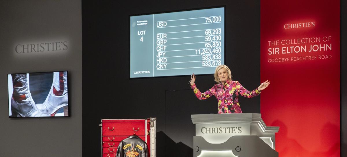 Tash Perrin, Christie's deputy chairman, Americas, auctioning a pair of Sir Elton John's silver leather platform boots for $94,500
Christie's Images Ltd 2024