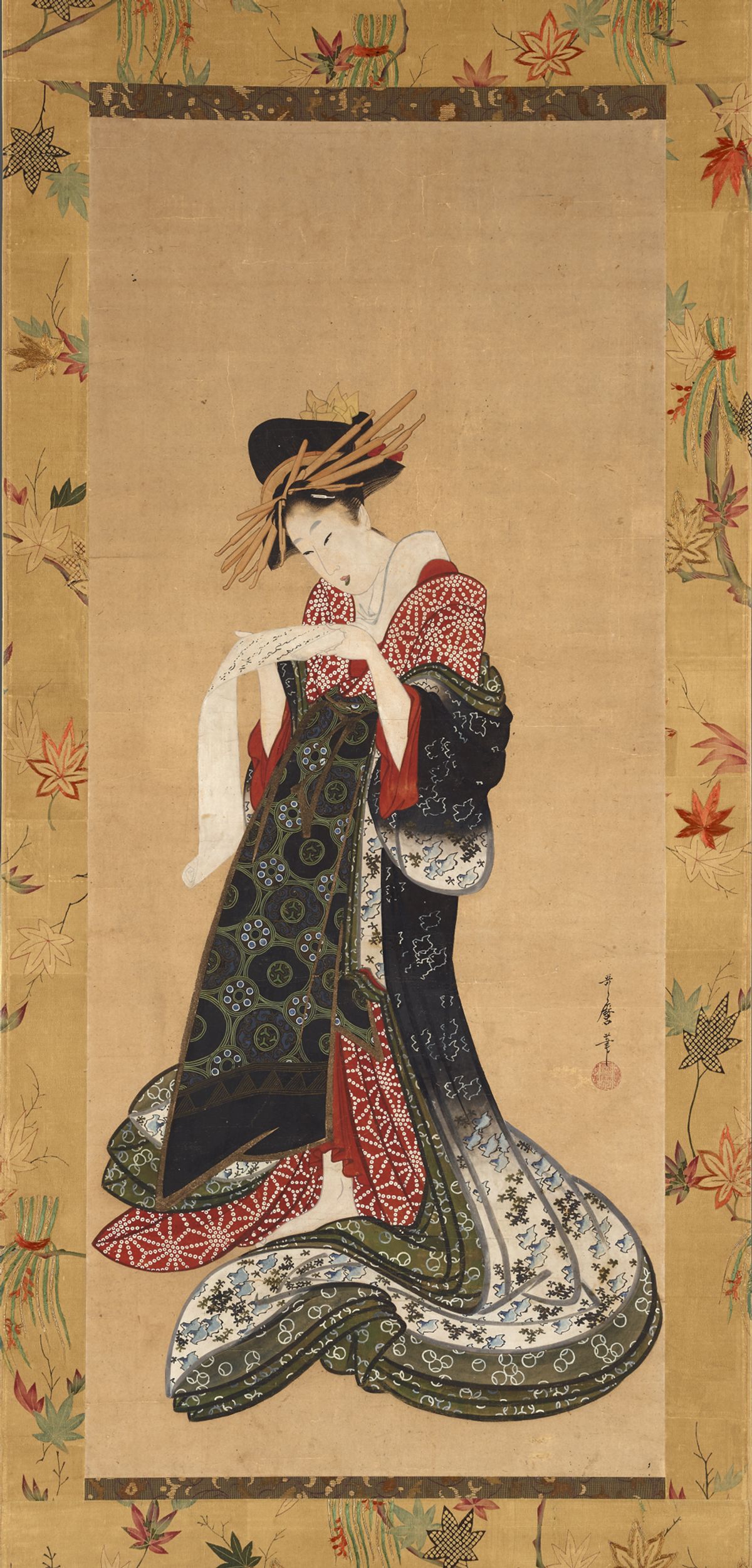 Kitagawa Utamaro's Courtesan reading a letter (around 1805-06) © The Trustees of the British Museum