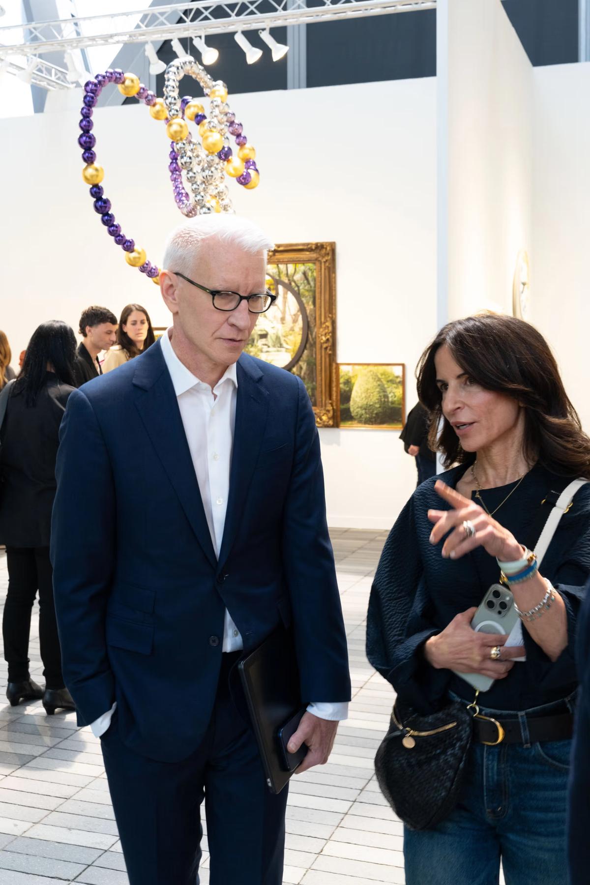 Making headlines: Anderson Cooper with art adviser Marisa Kayyem Photo: Steven Molina Contreras