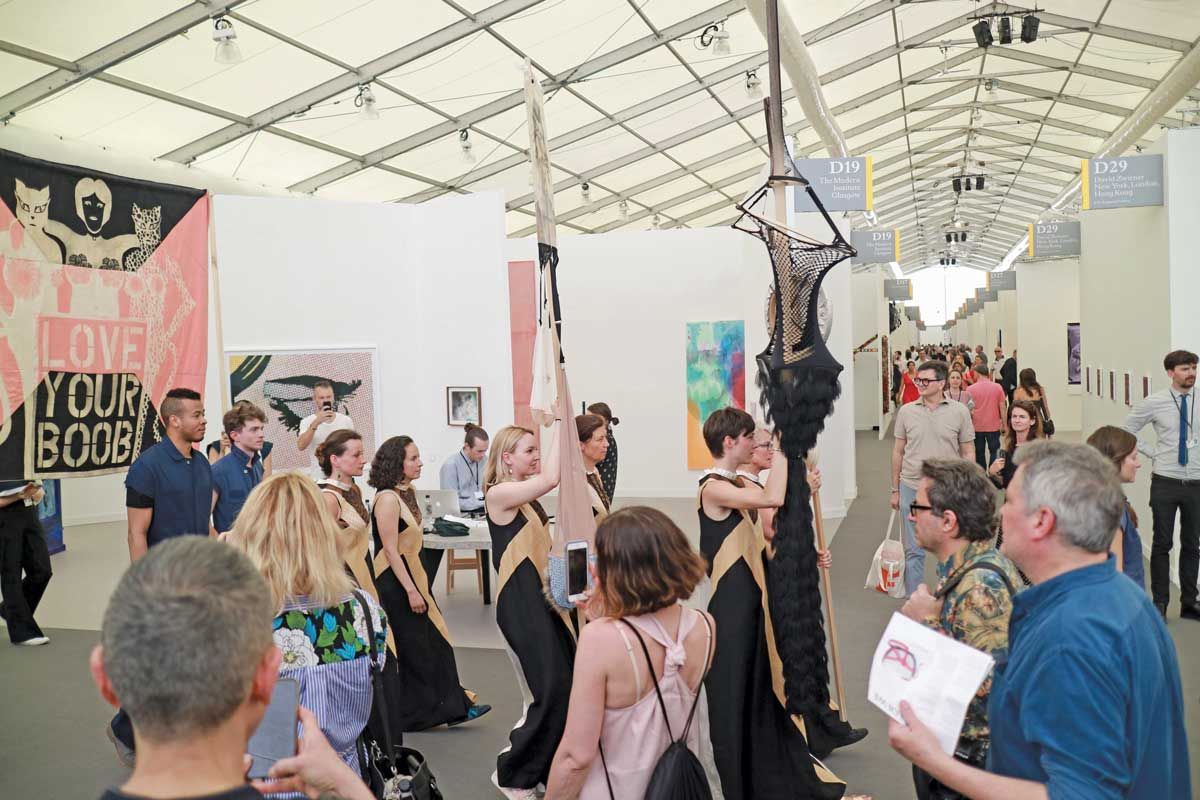 Volunteers take part in Lara Schnitger’s Suffragette City (2015-ongoing), updated to reflect #MeToo Casey Fatchett