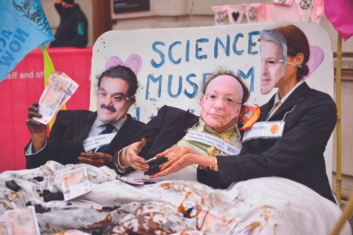 Activists dressed as Adani chairman Gautam Adani, Science Museum director Ian Blatchford and Shell CEO Ben van Beurden at the Science Museum in South Kensington, London

Photo: Thomas Krych/SOPA Images/Sipa USA, Alamy Stock Photo