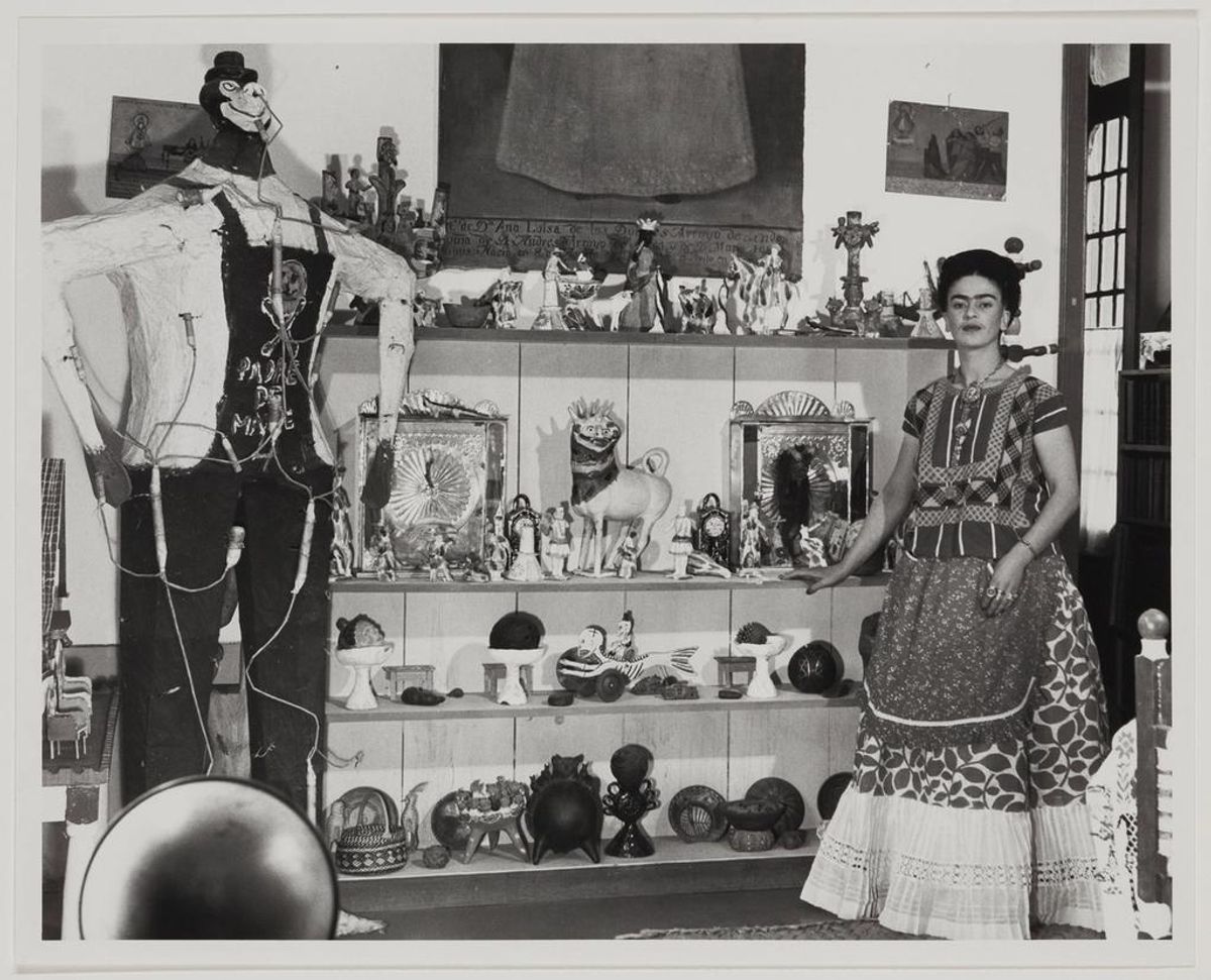Bernard Silberstein, Frida Kahlo in Rivera Living Room with Figure of Judas, around 1940. Courtesy of the Museum of Fine Arts, Boston.