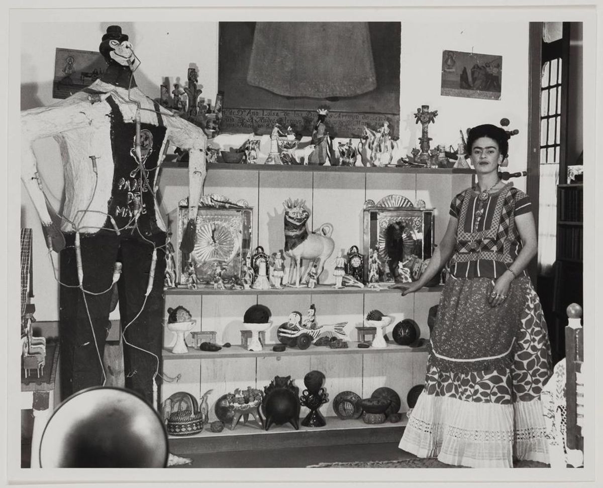 Bernard Silberstein, Frida Kahlo in Rivera Living Room with Figure of Judas, around 1940. Courtesy of the Museum of Fine Arts, Boston. 