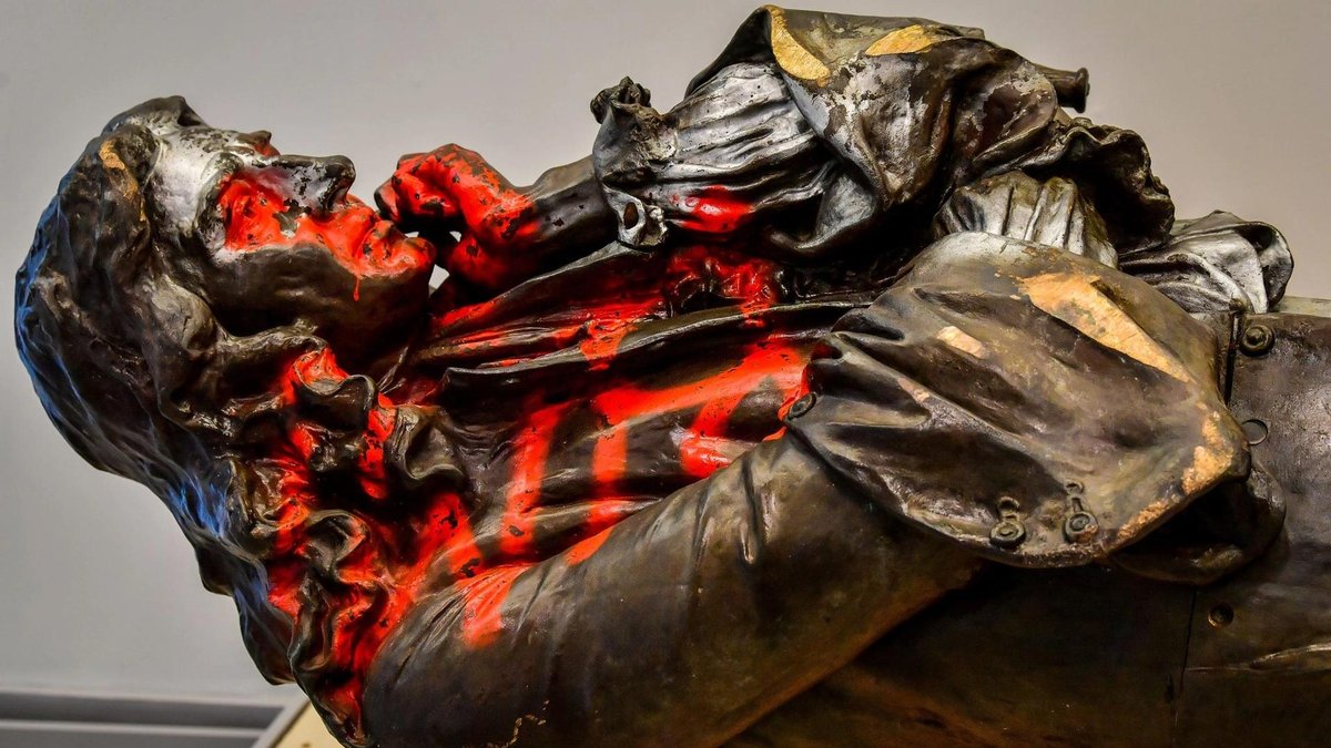 A new report says the Edward Colston statue should remain in it's current vandalised state and placed in a museum Finnbarr Webster/Getty Images