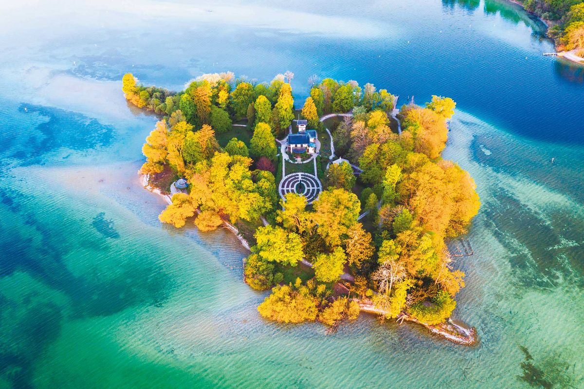 The picturesque Roseninsel (rose island) in Lake Starnberg in Bavaria, Germany, includes remains of prehistoric stilt-house settlements. The site is being assessed for the damage being wrought by waves, snow and ice as well as chemical and biological hazards

Photo: Martin Siepmann/Imagebroker/Alamy Stock Photo
