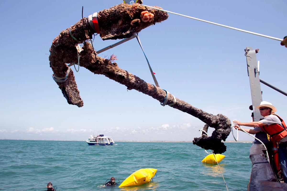 A 3,000 pound anchor from what is believed to be the wreck of the pirate Blackbeard's flagship, the Queen Anne's Revenge, is recovered from Beaufort Inlet, in North Carolina Robert Willett/The News & Observer via AP