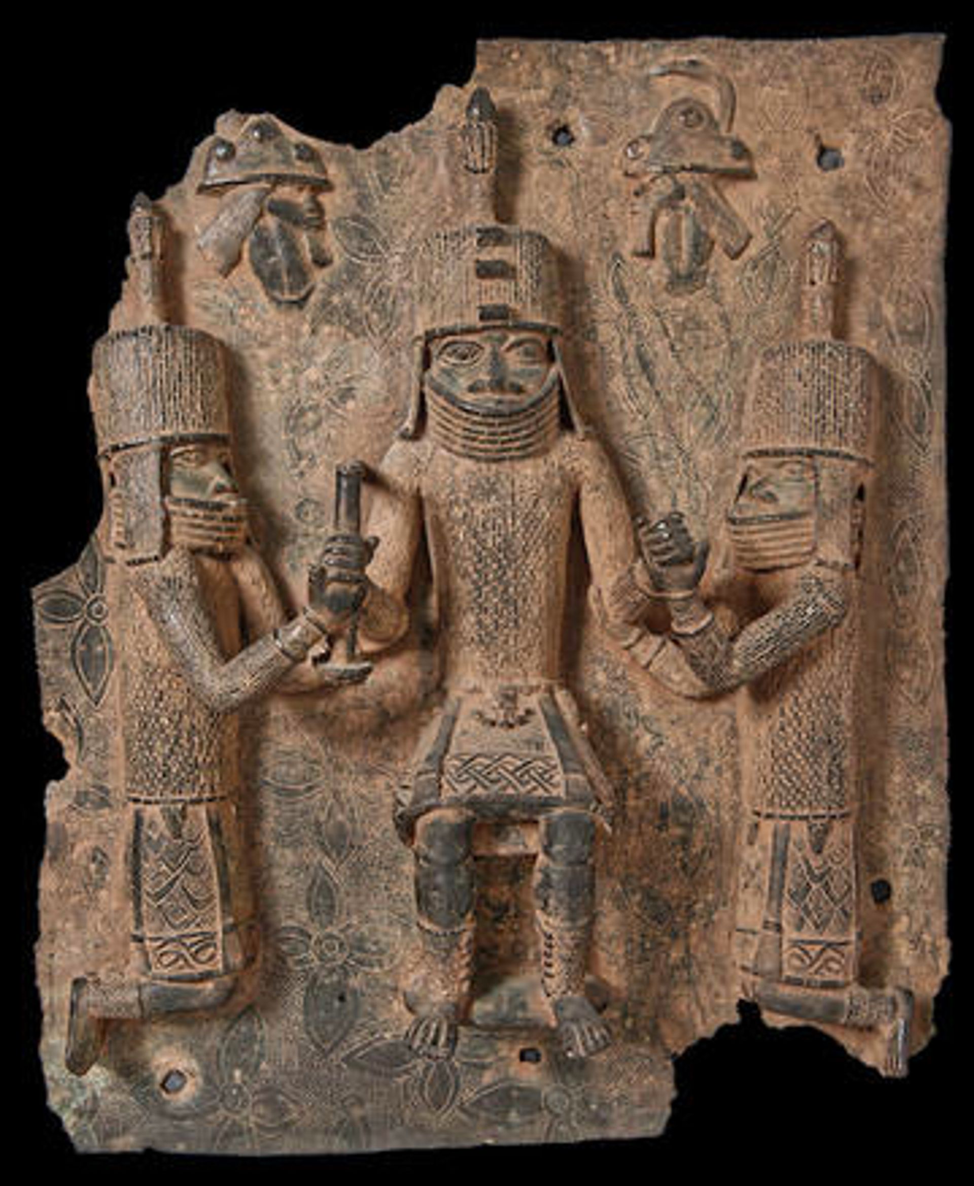 A Bronze Plaque looted from the Royal Palace of Benin, purchased by the Pitt Rivers Museum for five pounds in 1907 Image: courtesy of the museum 