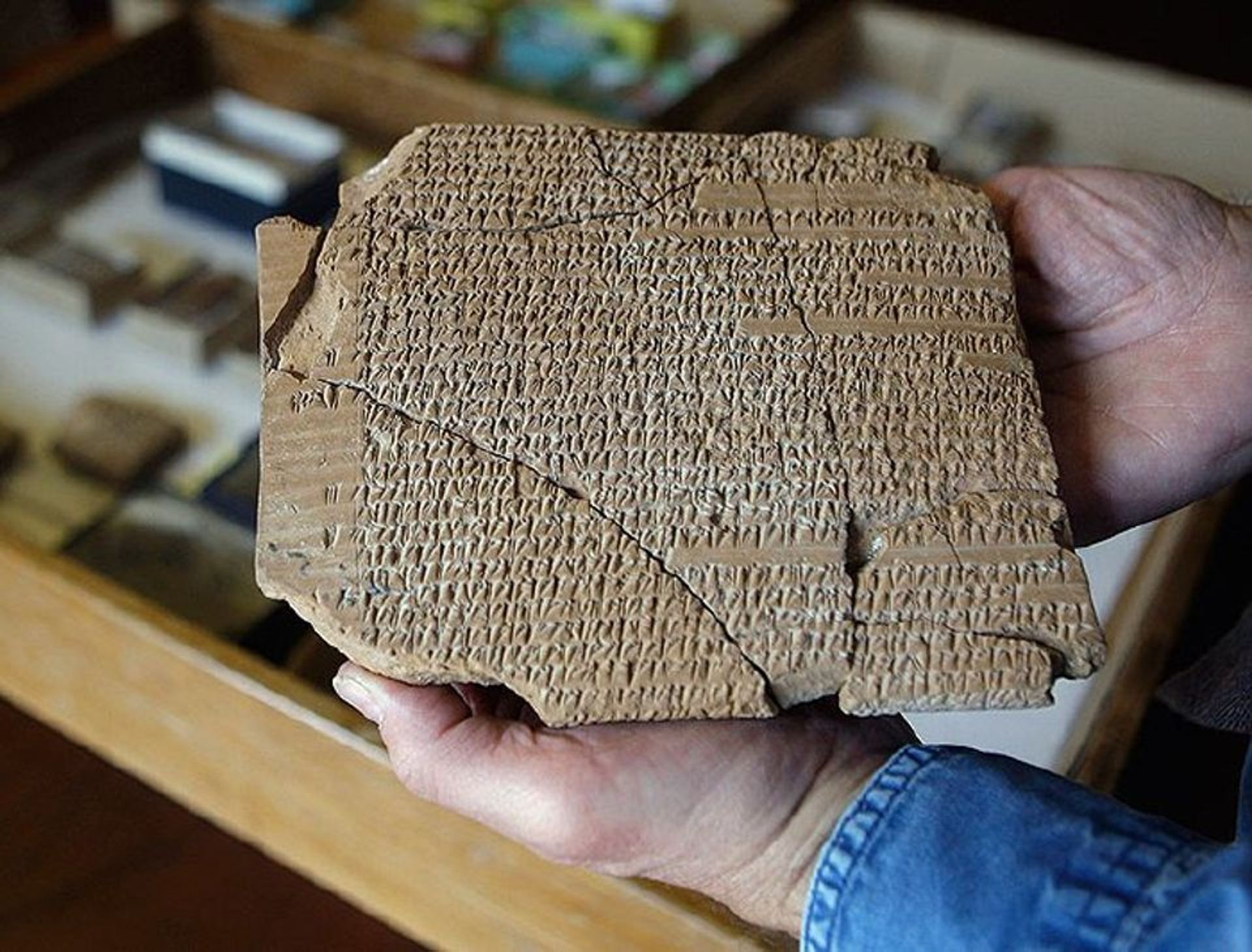 Matt Stolper, director of the Persepolis Fortification Archive at the University of Chicago’s Oriental Institute, holds a large tablet with cuneiform text AP Photo/M. Spencer Green