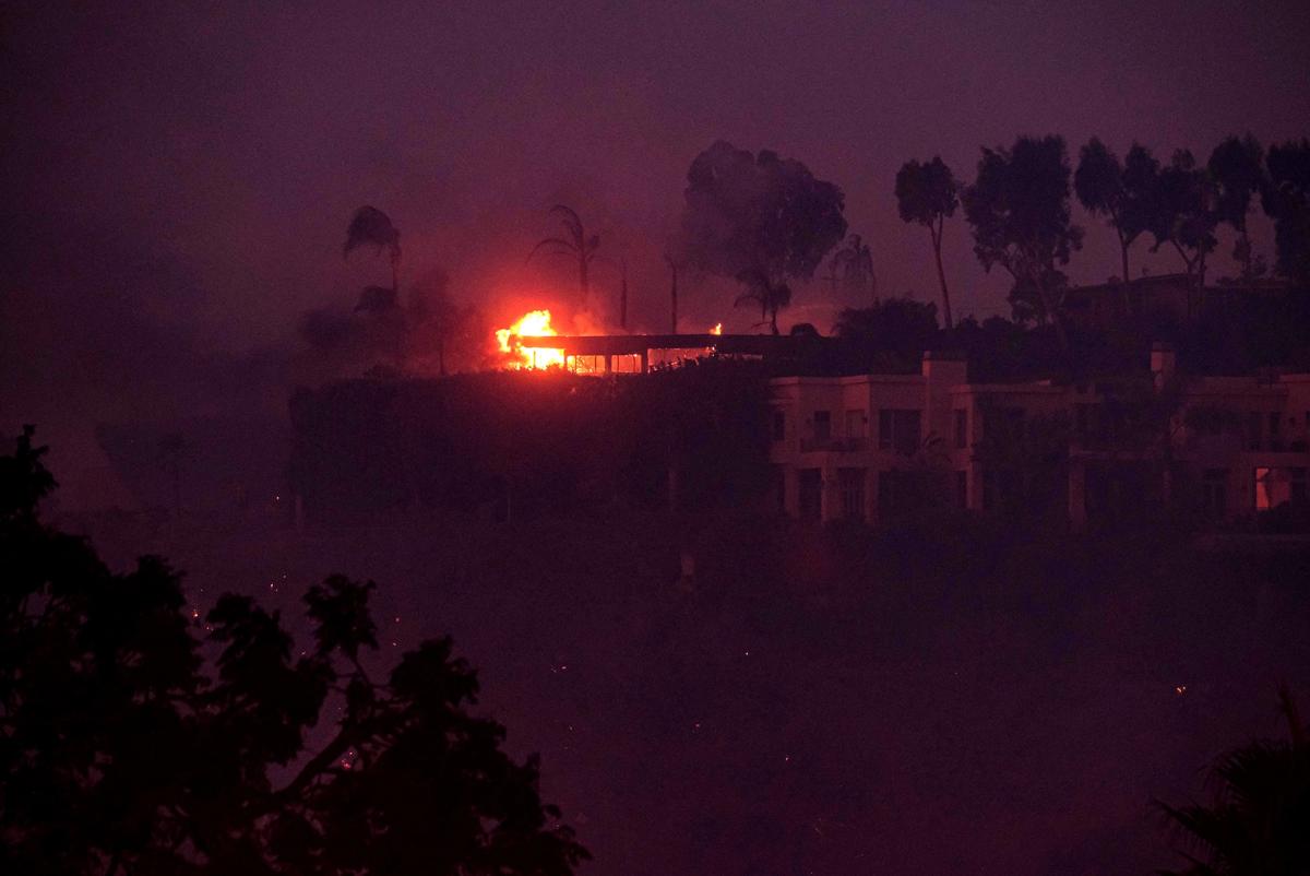 Wildfires burn near the 405 freeway and the Getty Center in Los Angeles on 30 October. Jason Ryan/ ZUMA Wire/ Shutterstock