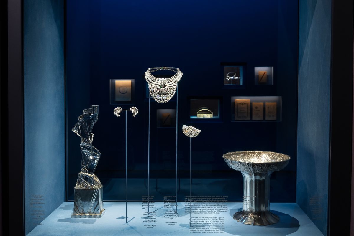 An installation view of Glanzstücke: Van Cleef & Arpels High Jewellery x Masterpieces from the MAK Collection at the Museum of Applied Arts in Vienna featuring, at centre, the platinum, diamond-encrusted necklace that formerly belonged to Queen Nazli of Egypt and was stolen in a robbery on 27 August © Van Cleef & Arpels