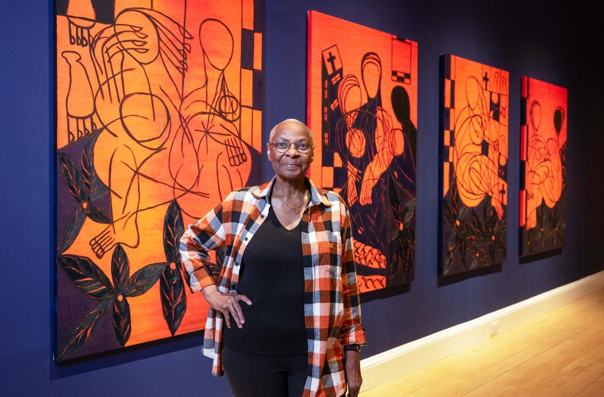 The artist, Everlyn Nicodemus, with works from her new series, Lazarus Jacaranda (2022–24), created for the exhibition at the National Galleries Scotland Photo by Neil Hanna