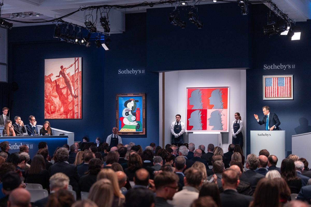 Sotheby's chairman and auctioneer Oliver Barker fielding bids during the auction of works from the collection of Emily Fisher Landau Courtesy Sotheby's