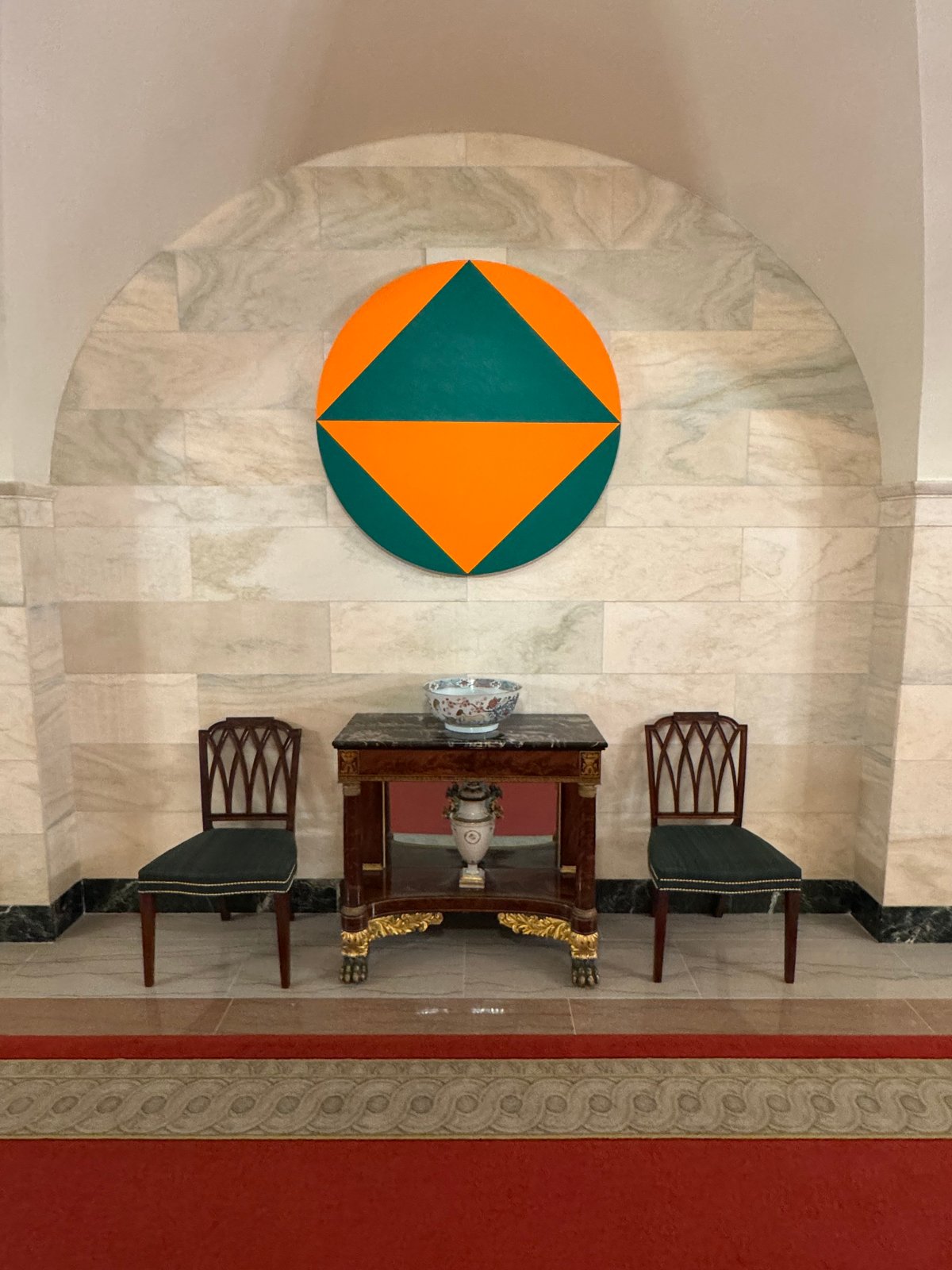 Carmen Herrera's Dia Feriado (2011) on view in the East Wing of the White House in Washington, DC Photo courtesy Henry R. Muñoz III