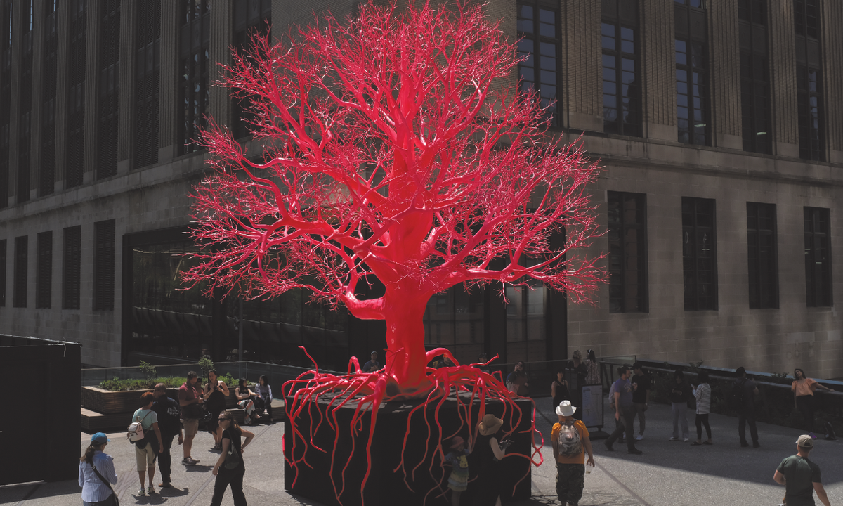 Pink Tree Object Show A hot pink tree sculpture sprouts amid New York's leafy High Line