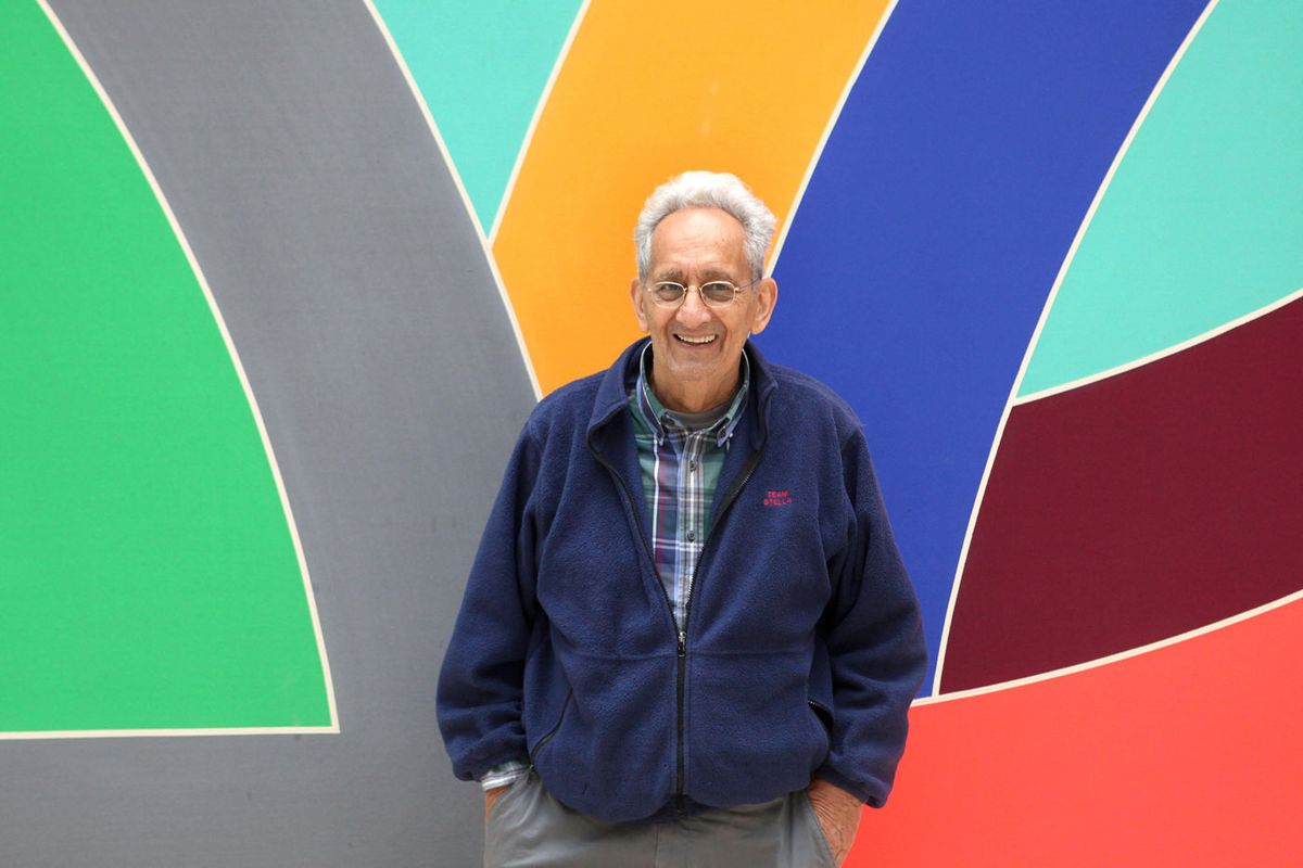 Frank Stella poses with one of his works at the Kunstmuseum in Wolfsburg, Germany, during his 2012 restrospective Photograph: Matthias Leitze/Alamy Stock Photo