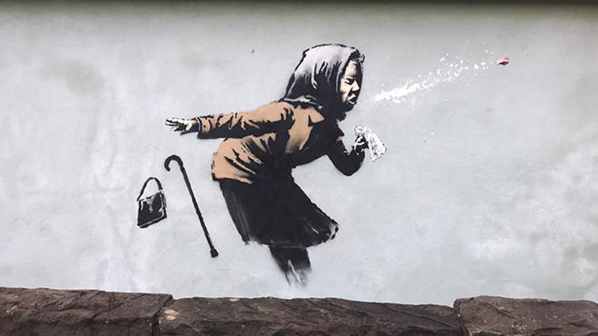 Cover Your Mouth Banksy Claims Mural Of Sneezing Woman In Bristol