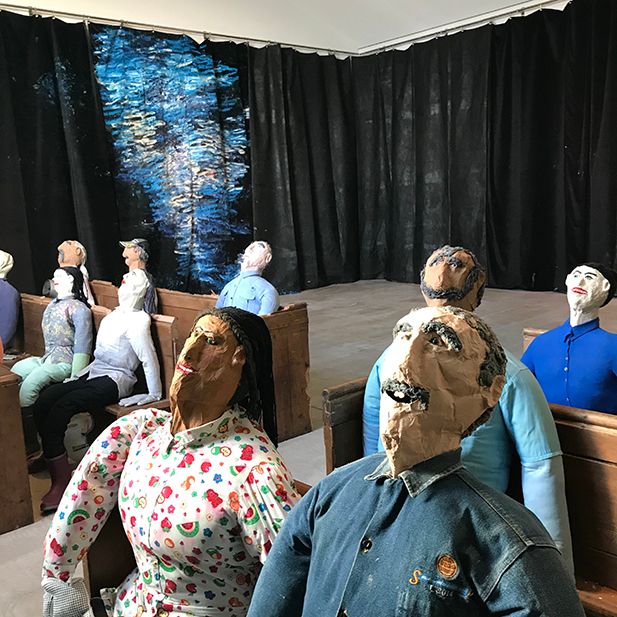 Oscar Murillo's new site specific installation of unstretched canvases and effigies in the Turner Prize exhibition Courtesy Louisa Buck