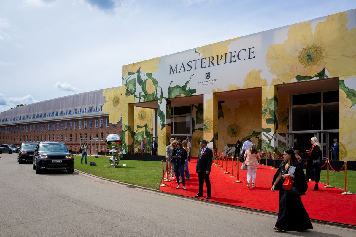 Masterpiece London's sunny entrance, decorated with huge yellow flowers by British artist Sarah Graham Ben Fisher Photography, courtesy of Masterpiece London