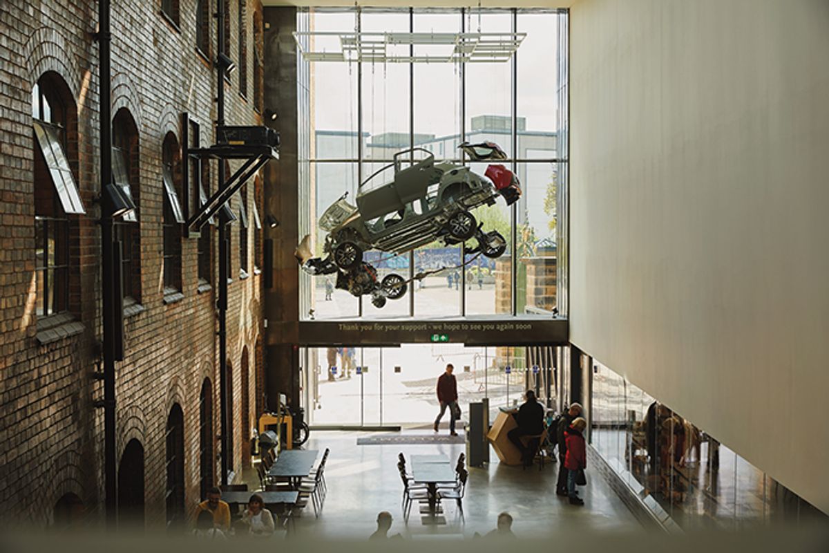 A deconstructed Toyota Corolla hangs above the entrance © Emli Bendixen/Art Fund