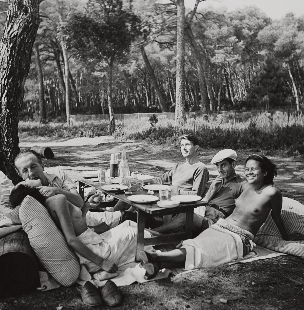 Picnic, Île Sainte-Marguerite, Cannes, France (1937) by Lee Miller © 2023 Lee Miller Archives, England. All rights reserved