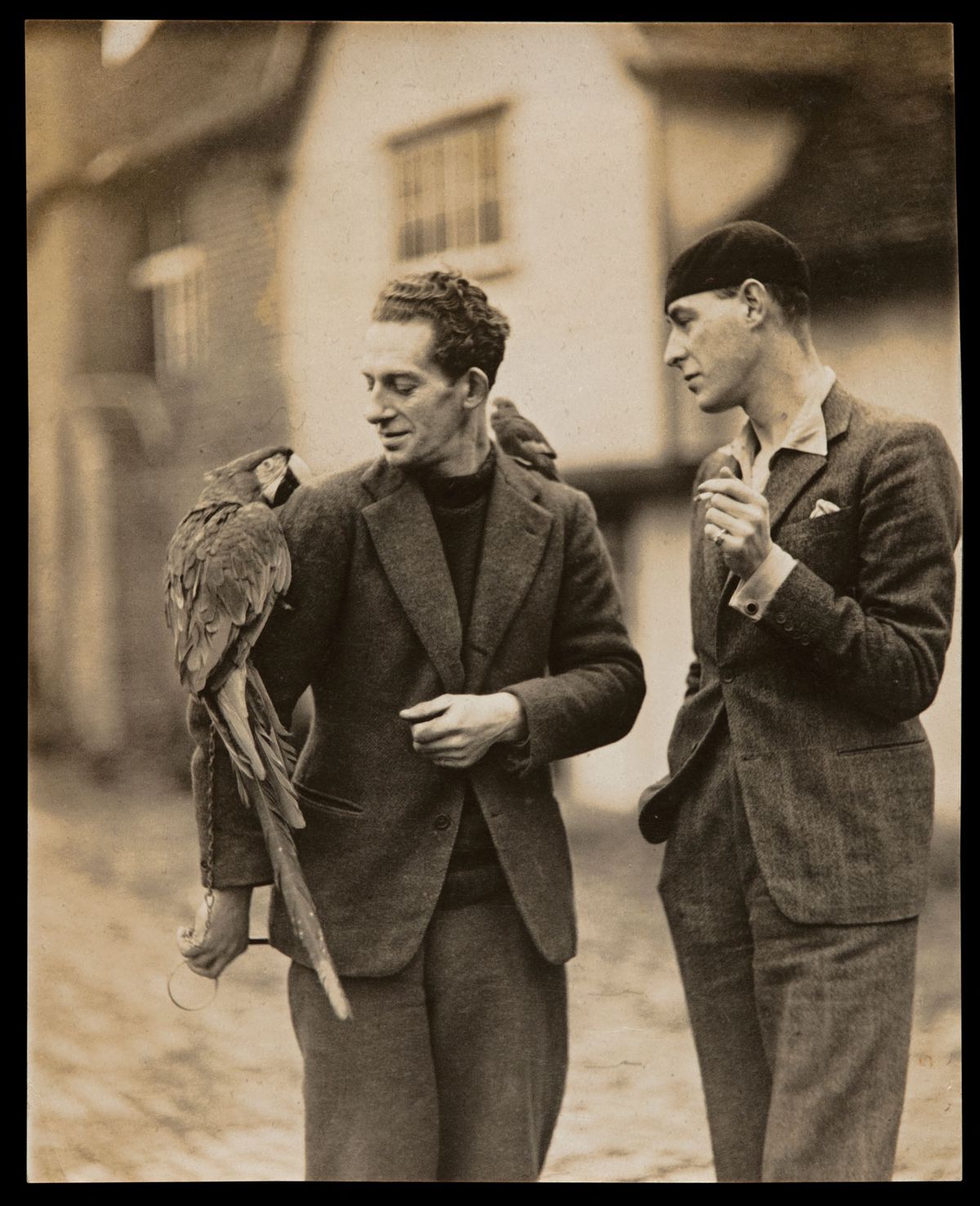 Cedric Morris and Arthur Lett Haines with a macaw © Cedric Morris estate/ © Tate Archive
