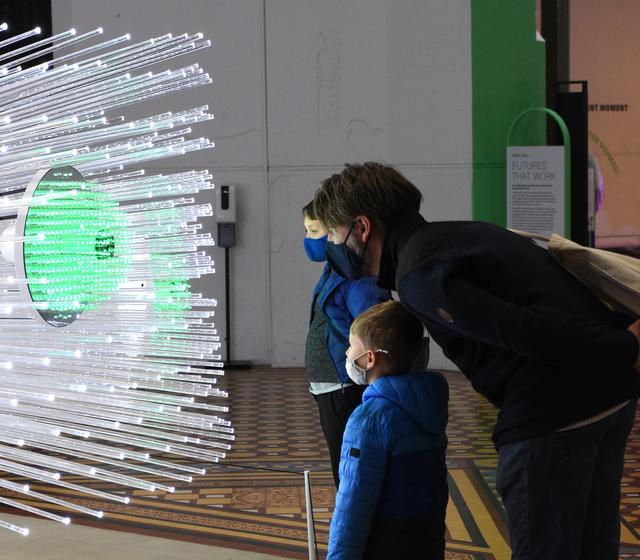 Visitors at the Smithsonian's Arts and Industries Building in December 2021 Photo by Amaury Laporte, via Flickr