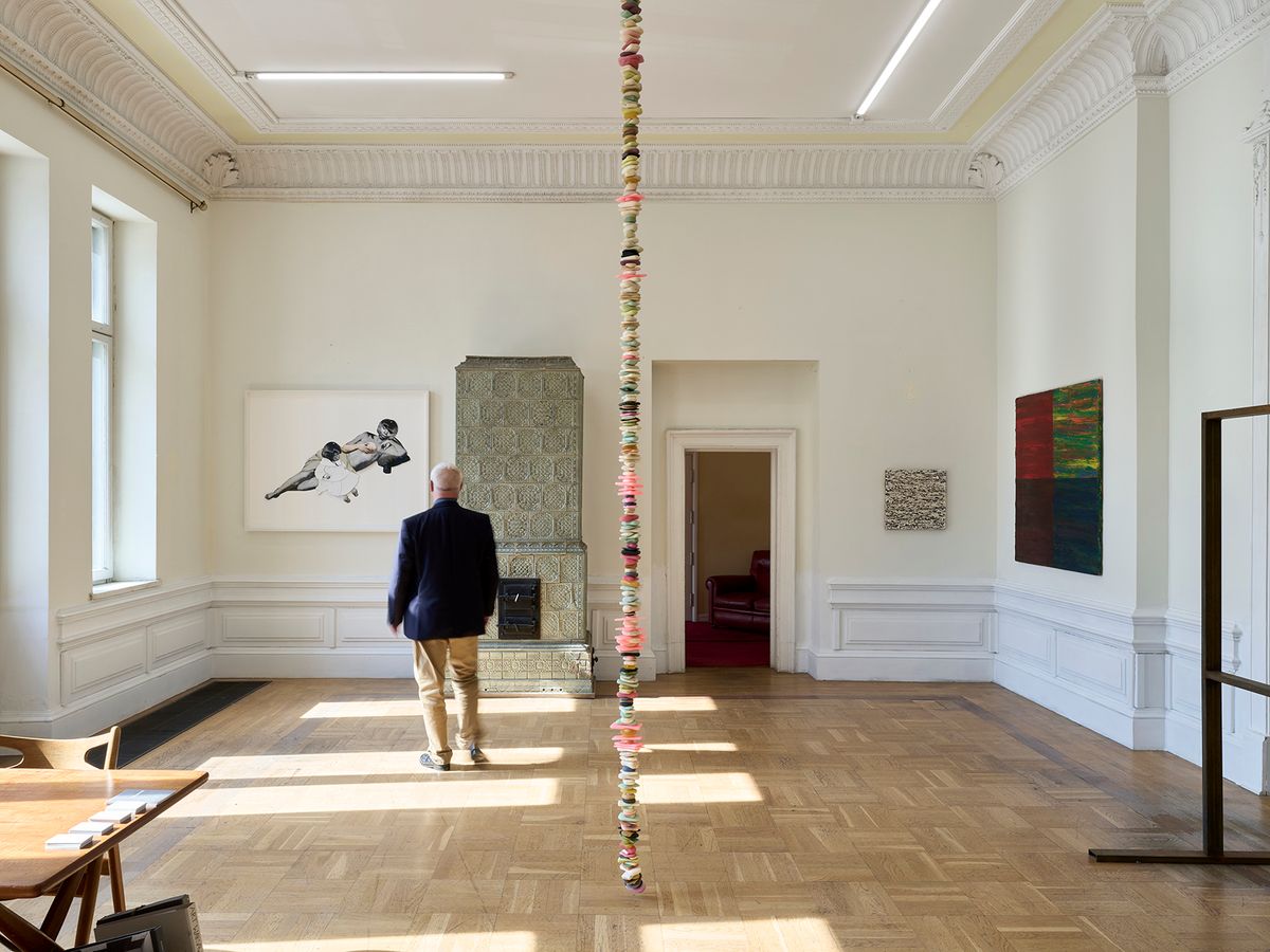 A visitor to Galerie Nordenhake's presentation at Art Warsaw in the Villa Róż
Courtesy of Galerie Nordenhake Berlin/Stockholm/Mexico City © The artists. Photo: Błażej Pindor