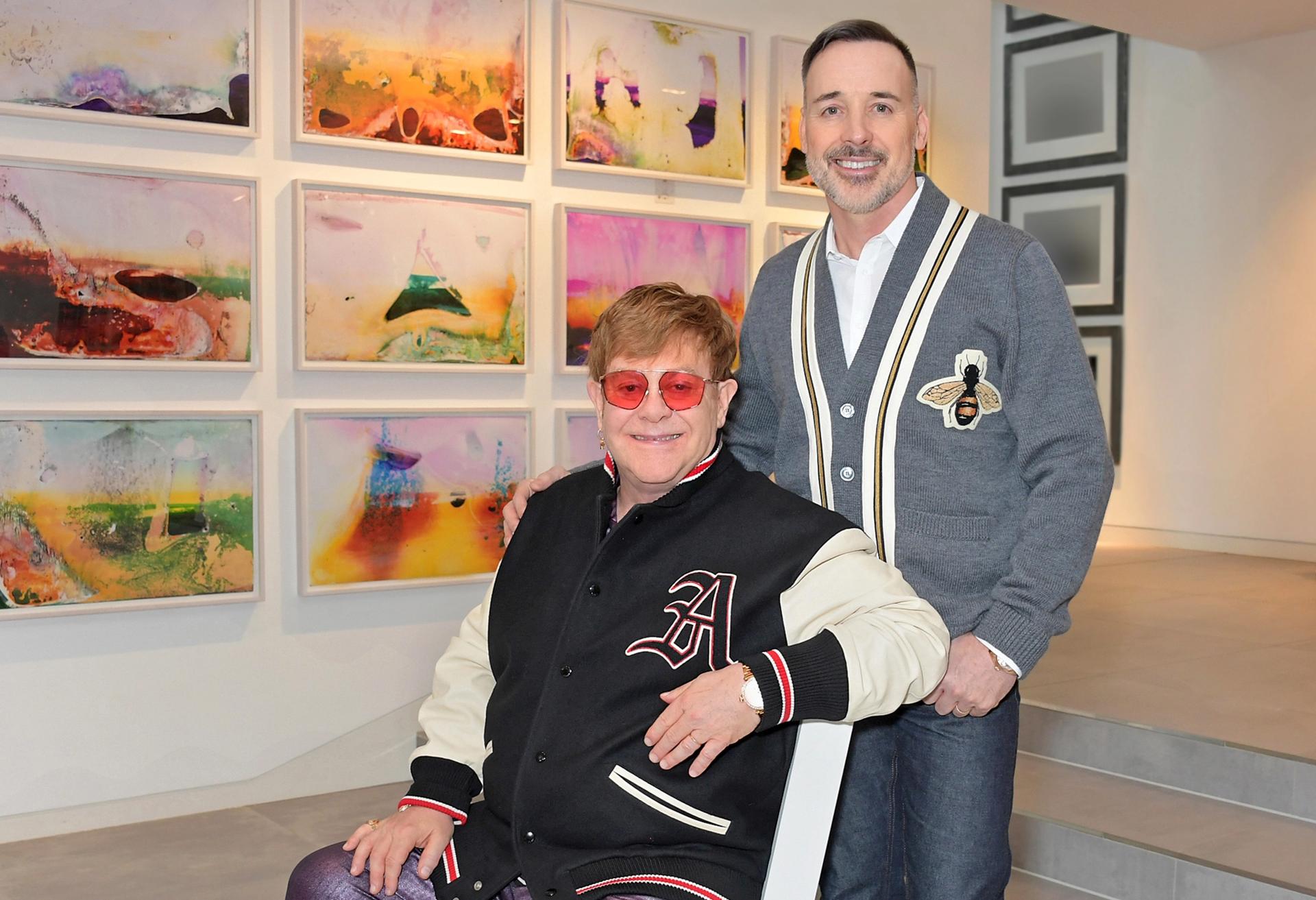 Elton John and David Furnish in the gallery named after them © Dave Benett Getty Images for the V&A