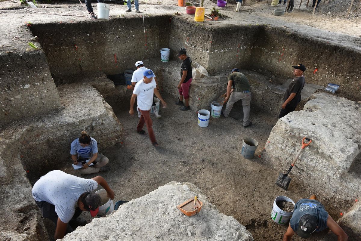 Archaeologists excavating the cruciform at Aguada Fénix, before discovering the cache in the centre of the pit Photo: Takeshi Inomata/University of Arizona