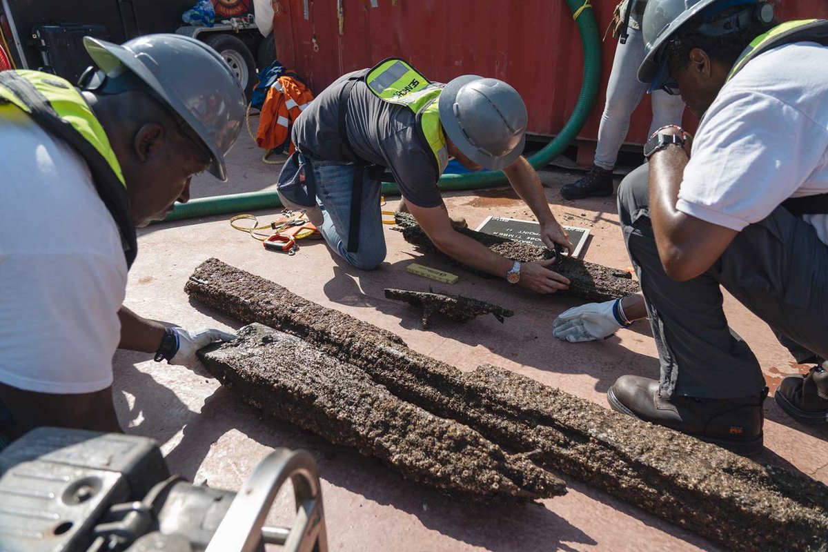 Workers assess the state of timbers from the wreck of the Clotilda, which was scuppered in the Mobile River in 1860 to conceal its crime of trafficking enslaved people
Photo: courtesy of Alabama Historical Commission