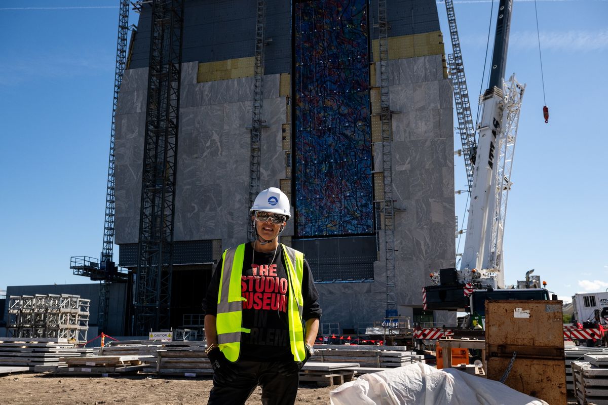 Artist Julie Mehretu tours the Obama Presidential Center site during the installation of her commissioned artwork, the 83ft-tall painted glass window titled Uprising of the Sun, in Chicago on 7 September Courtesy The Obama Foundation
