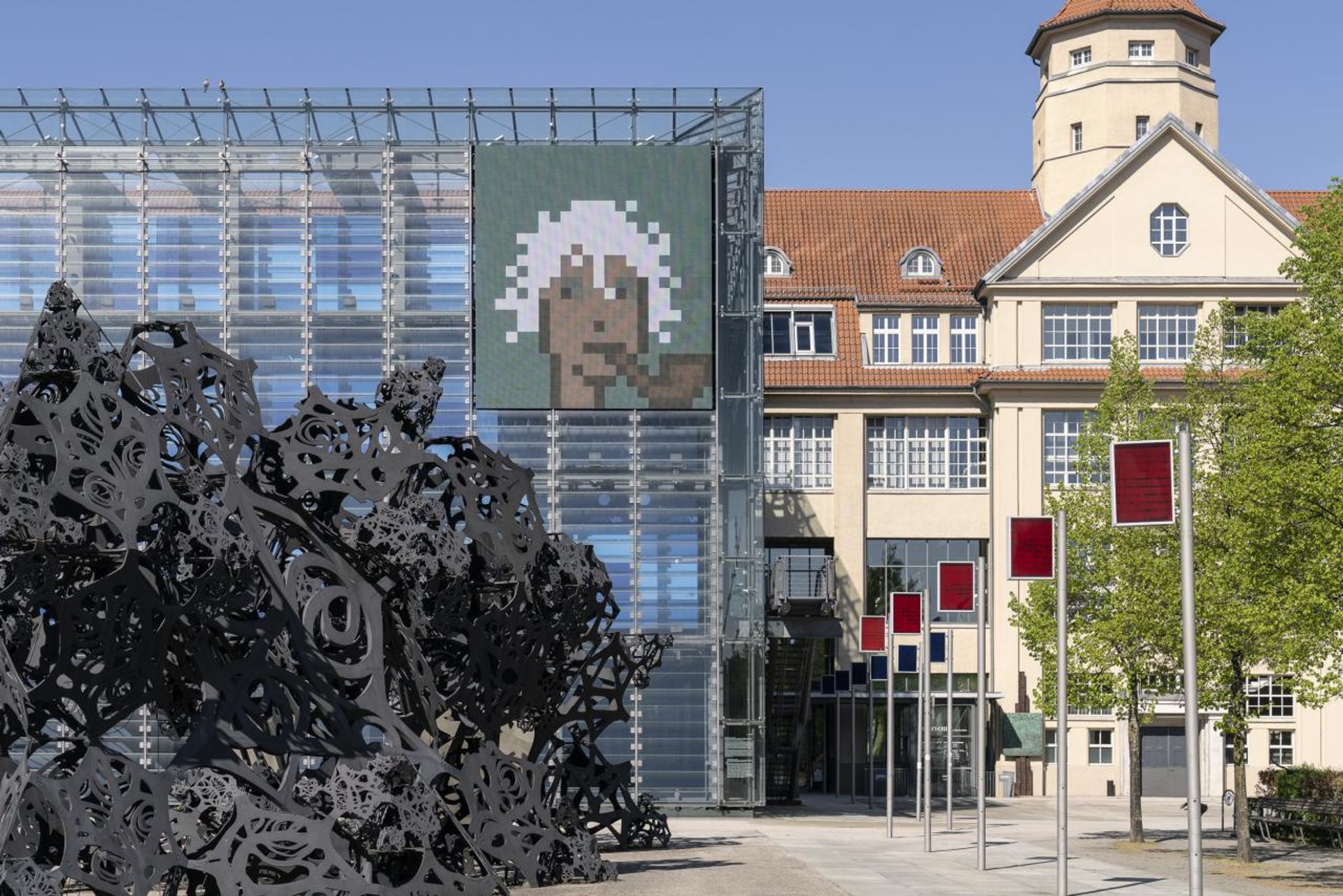 John Watkinson and Matt Hall's Cryptopunk on the facade of ZKM, Karlsruhe