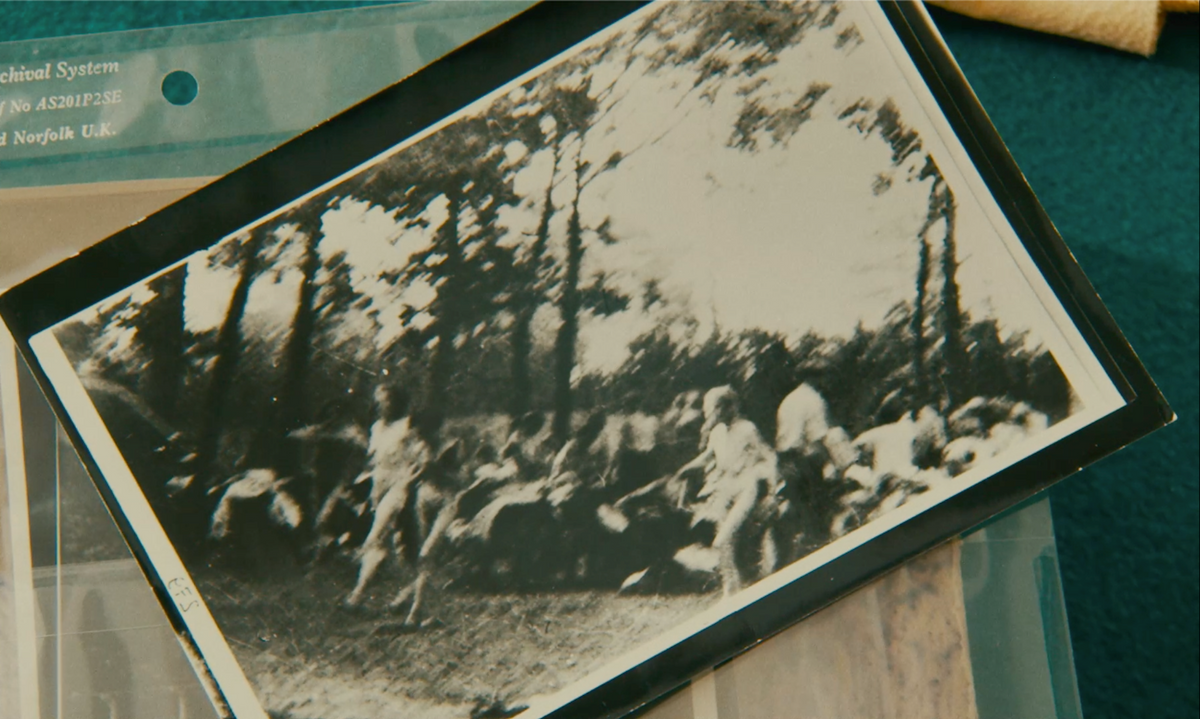 A scene in From Where They Stood featuring a photograph of women at Birkenau in August 1944, walking to the gas chamber. Courtesy Greenwich Entertainment. © L'atelier documentaire