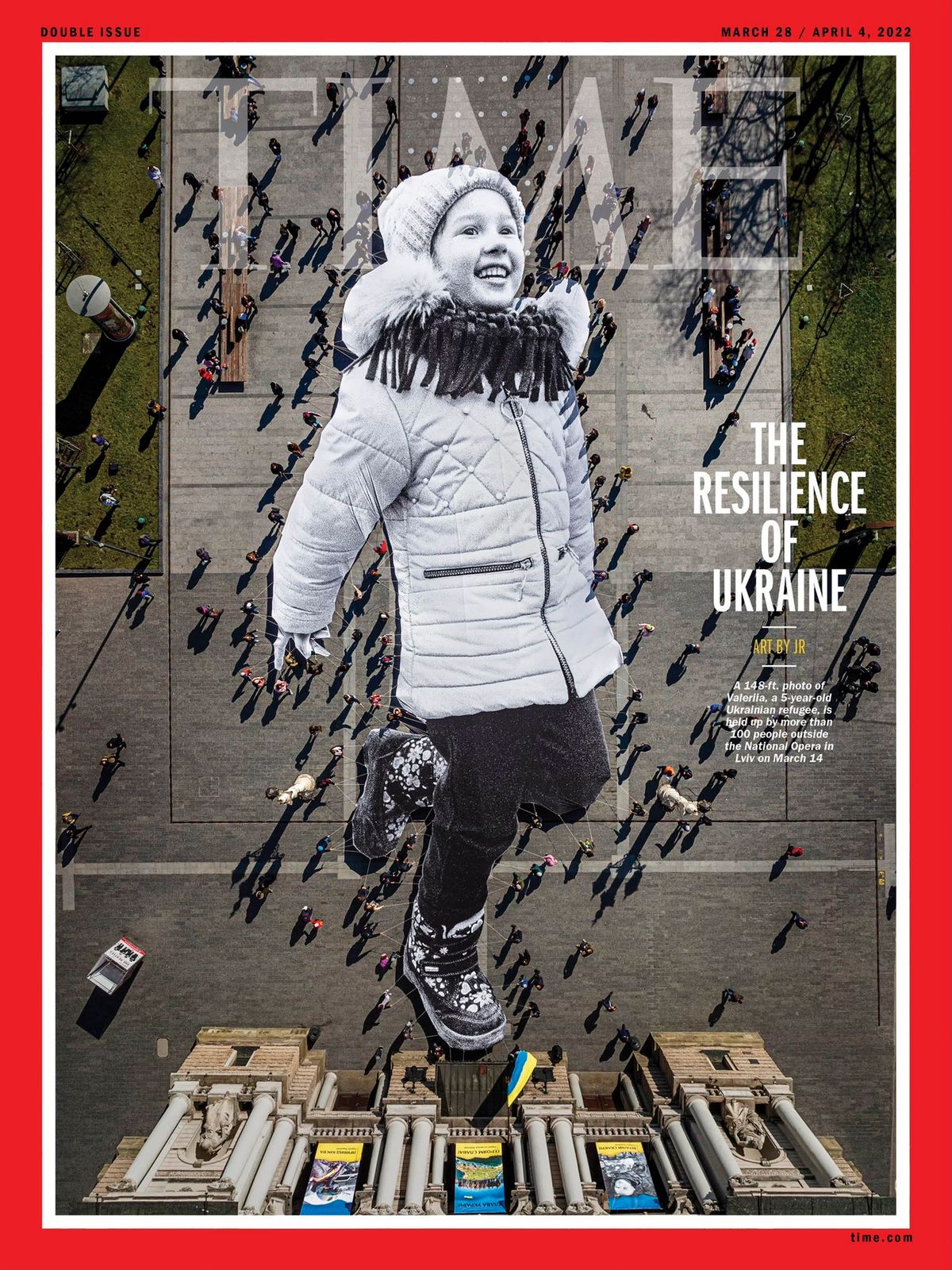 More than 100 people helped unfurl JR's giant photograph of a young Ukrainian refugee in the city of Lviv Courtesy of the artist and Time magazine