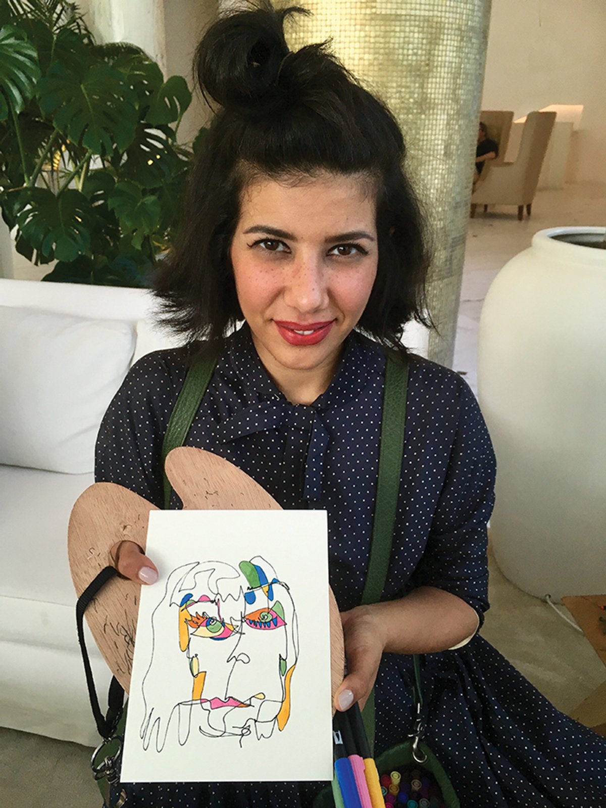 Moral Turgeman with her portrait of our intrepid reporter, Louisa Buck Louisa Buck