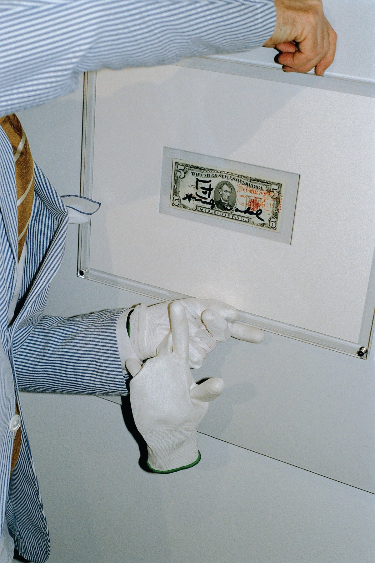 A framed dollar bill signed by Andy Warhol is up for grabs in Basel Social Club’s raffle Marnik Alfons Boekaerts