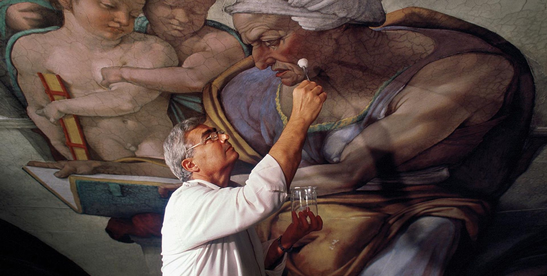 Gianluigi Colalucci works on the Cumaean Sibyl during the restoration of Michelangelo’s  vaulted ceiling of the Sistine Chapel in January 1987 Gianni Giansanti/Gamma-Rapho via Getty Images