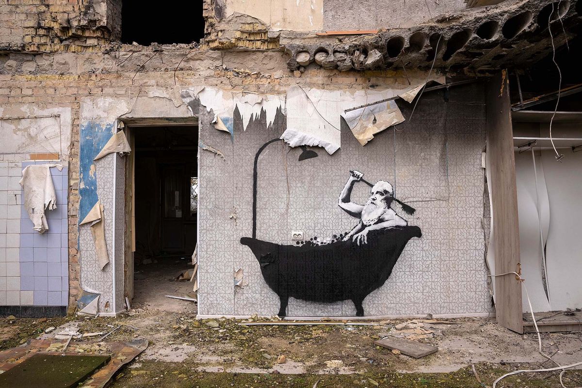 A Banksy mural recently painted on a partially demolished building in Horenka, Ukraine
