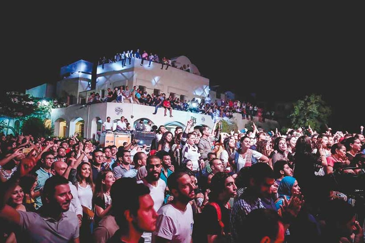 Crowds at an event at the Darb 1718 cultural centre. The venue is among several sites in Cairo’s historic Fustat area that are at risk of destruction
© Darb 1718
