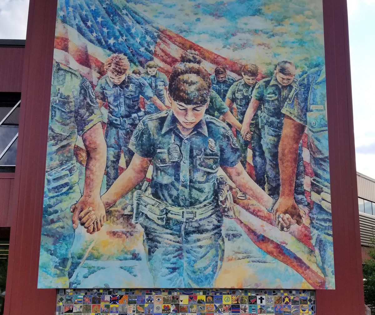 A mural honouring the police in Sterling Heights, Michigan is accompanied by rows of tiles created by officers and their families Courtesy of Sterling Heights City Hall