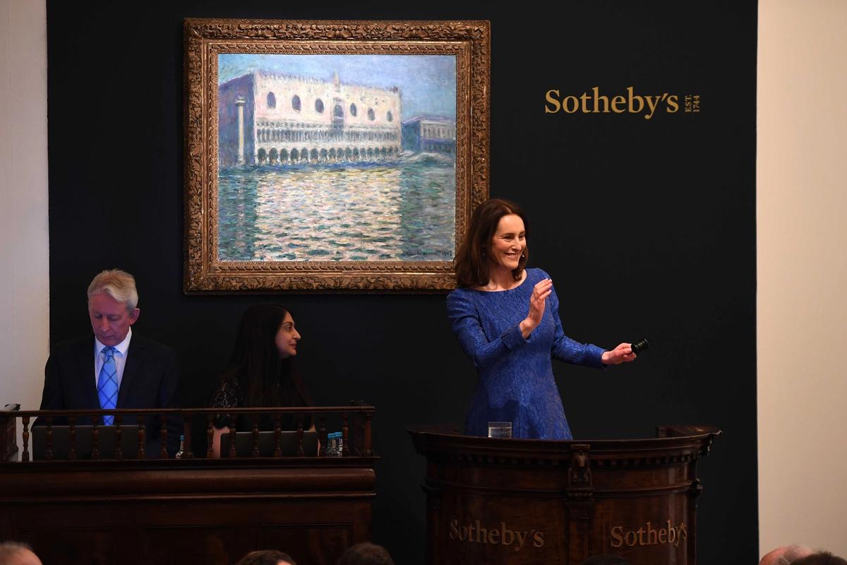 Auctioneer Helena Newman in front of Monet's view of Le Palais Ducal (1908) which sold for £24m (plus fees) at Sotheby's Courtesy of Sotheby's