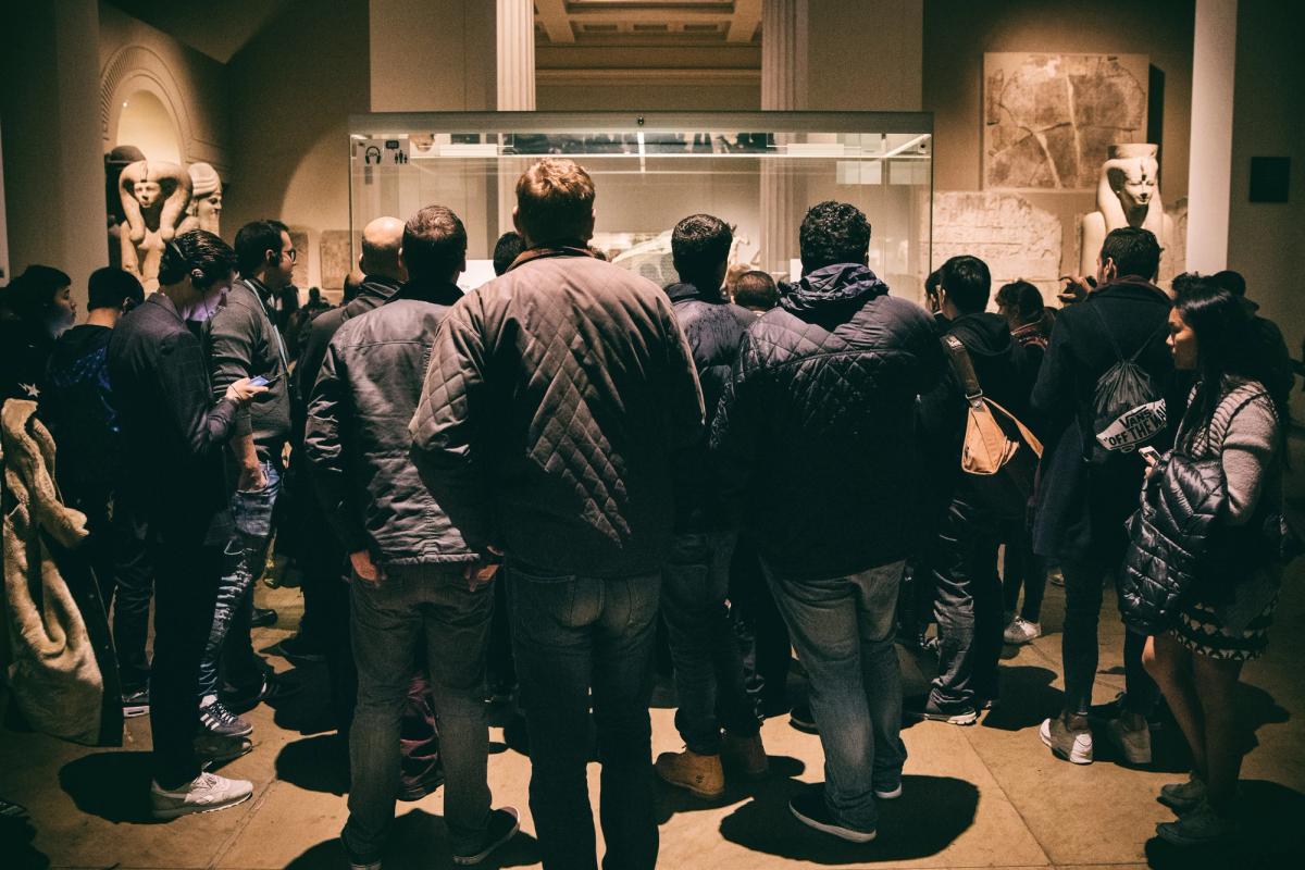 People gathering around the Rosetta Stone in the British        Museum in London © Christian Lendl