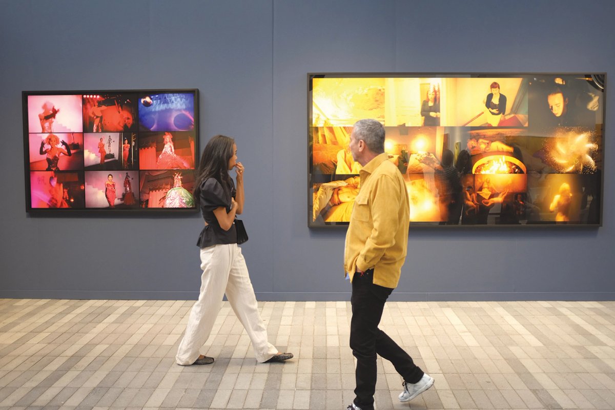 Visitors walk past photographs by Nan Goldin, the latest addition to Gagosian’s roster
Photo: Alex Wroblewski