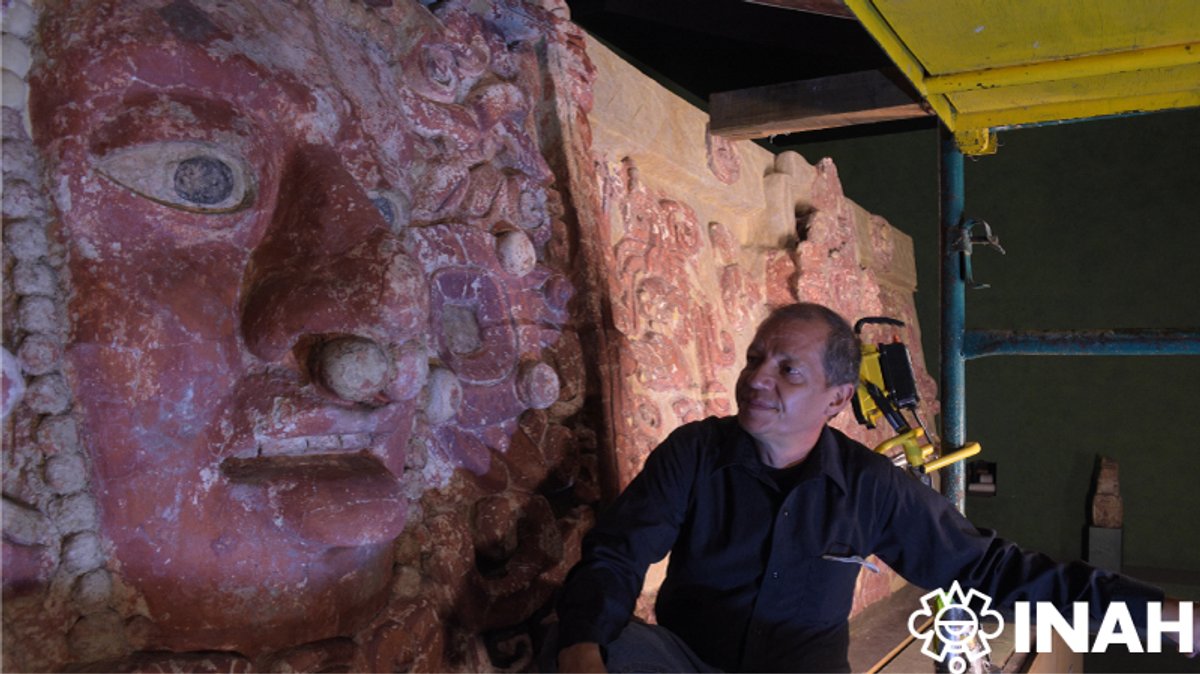 Conservator Sergio González García with the Pleasures Relief at the Museo Nacional de Antropología. Meliton Tapia; courtesy Instituto Nacional de Antropología e Historia.