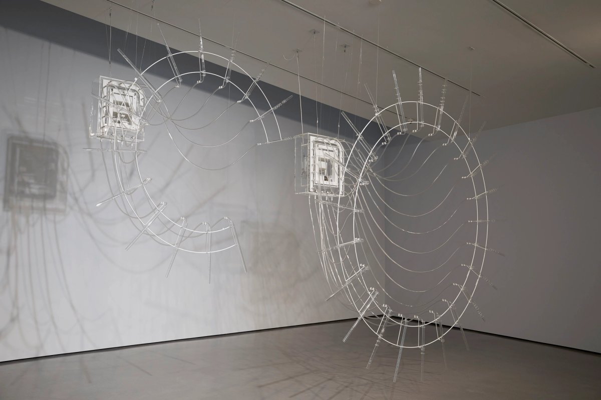 Cerith Wyn Evans, Composition for 37 flutes (in two parts), (2018), 37 crystal glass flutes, ‘breathing’ unit and valve system, plastic tubes Photo: Stuart Whipps