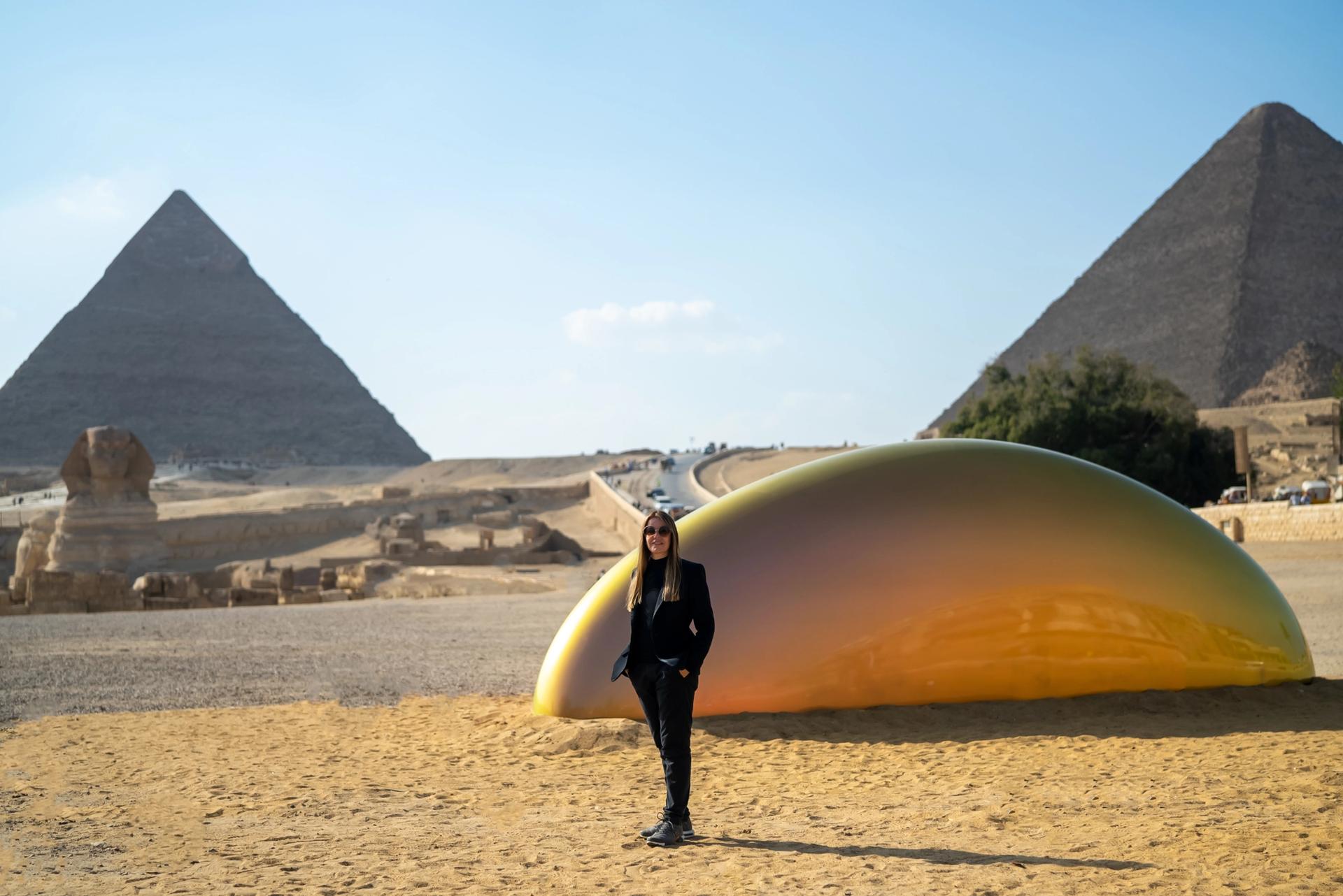 Artist Gisela Colón in front of her sculpture Eternity Now at the Pyramids of Giza Photo: Hesham Al Saifi; courtesy of Art d'Egypte 