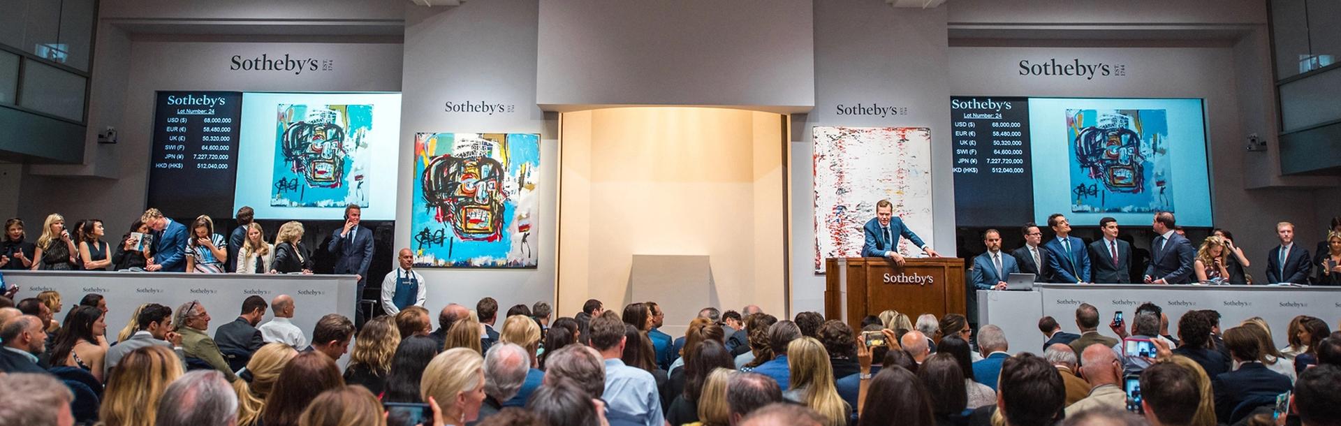 Auctioneer Oliver Barker took the winning bid on Jean-Michel Basquiat's Untitled (1982), which sold for $110.5m last May at Sotheby's New York Courtesy of Sotheby's