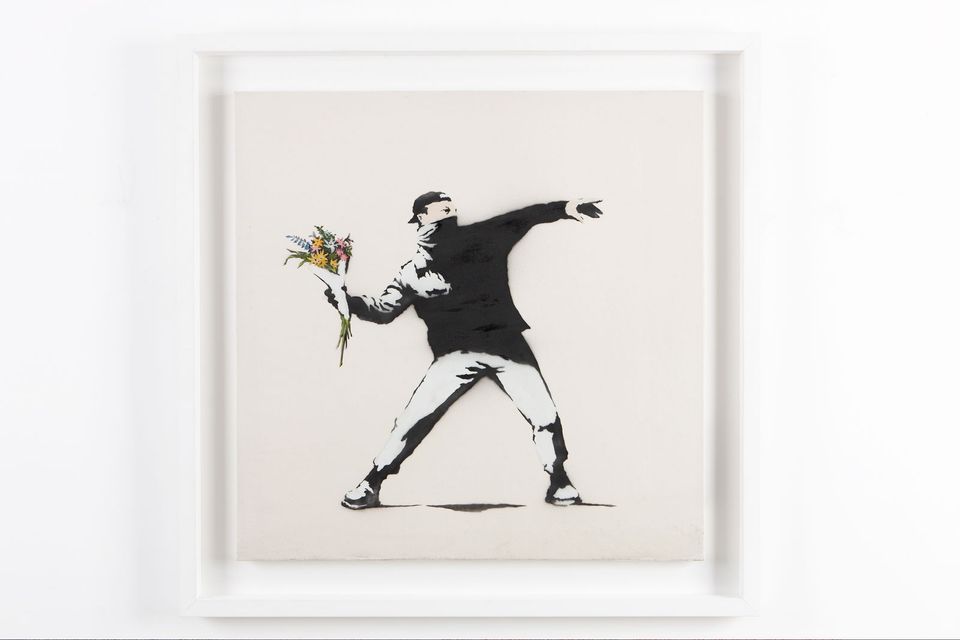 Banksy loses trademark battle over his famous Flower Thrower image